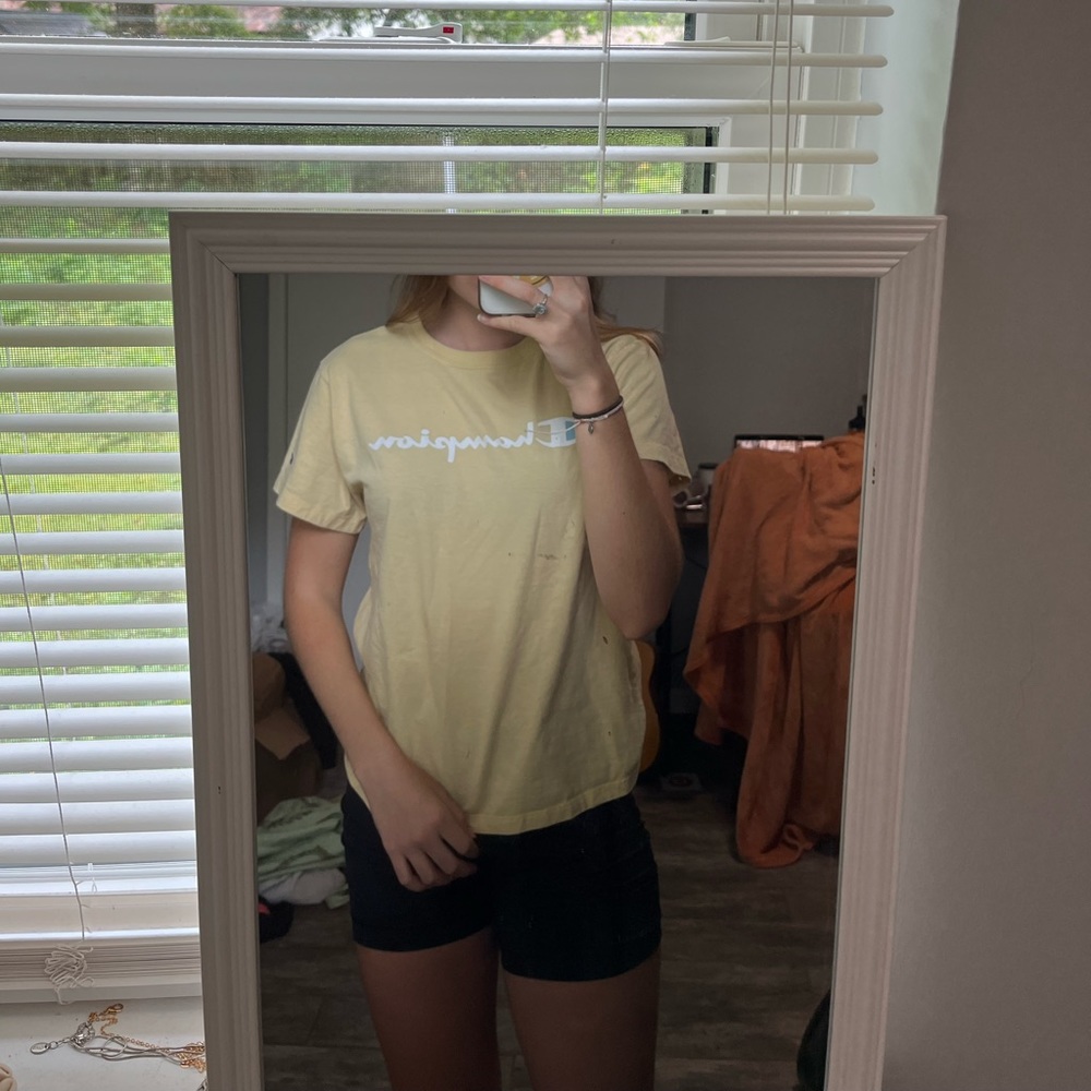 two champion shirts - blue and yellow